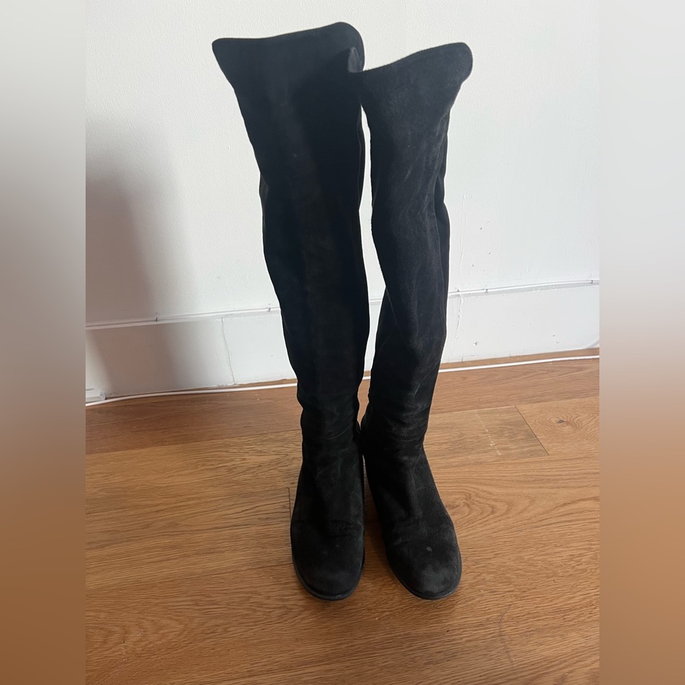 Black platform Stuart Weitzman stretch and suede over the knee boots.